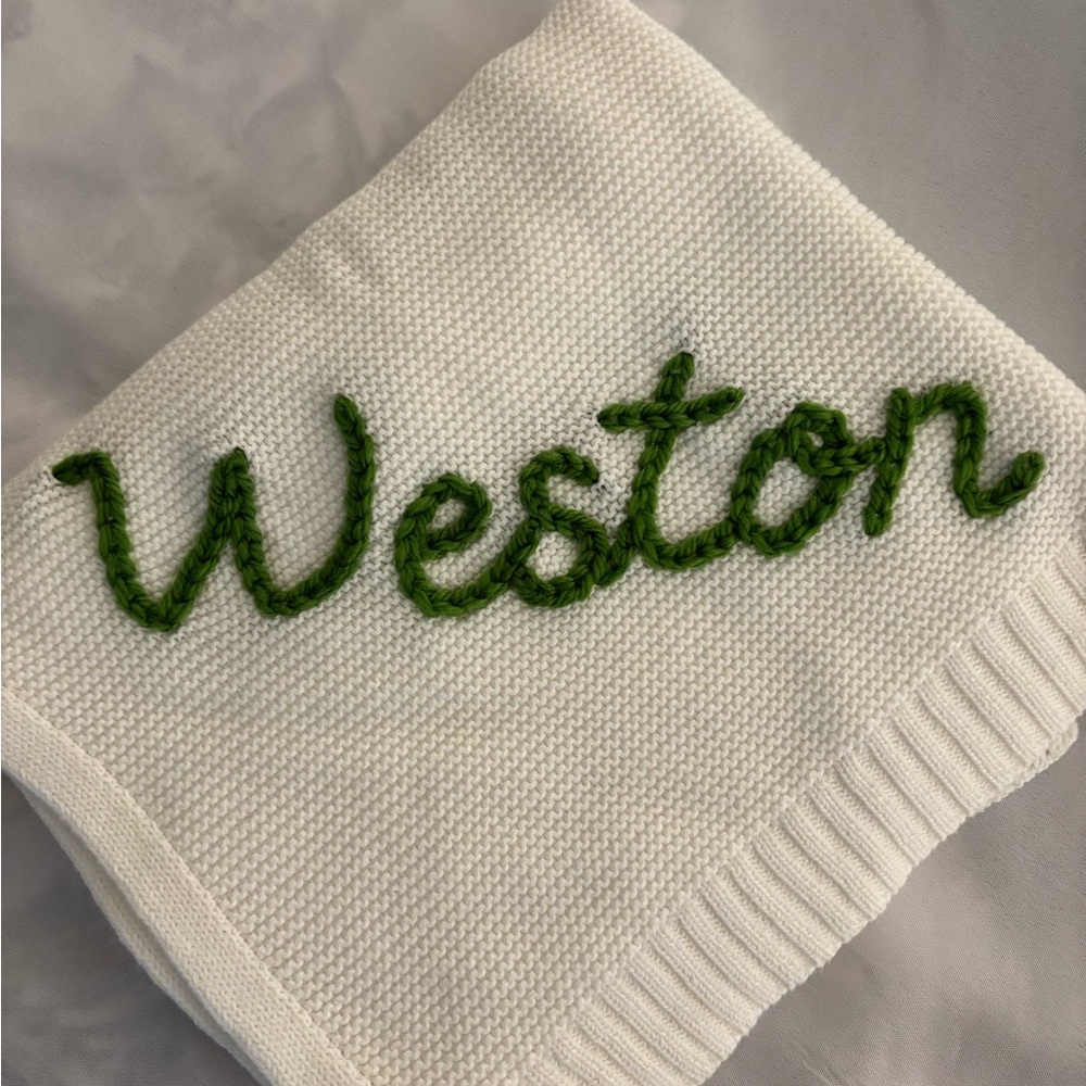Adorable NWOT white knit baby blanket with name Weston on it.